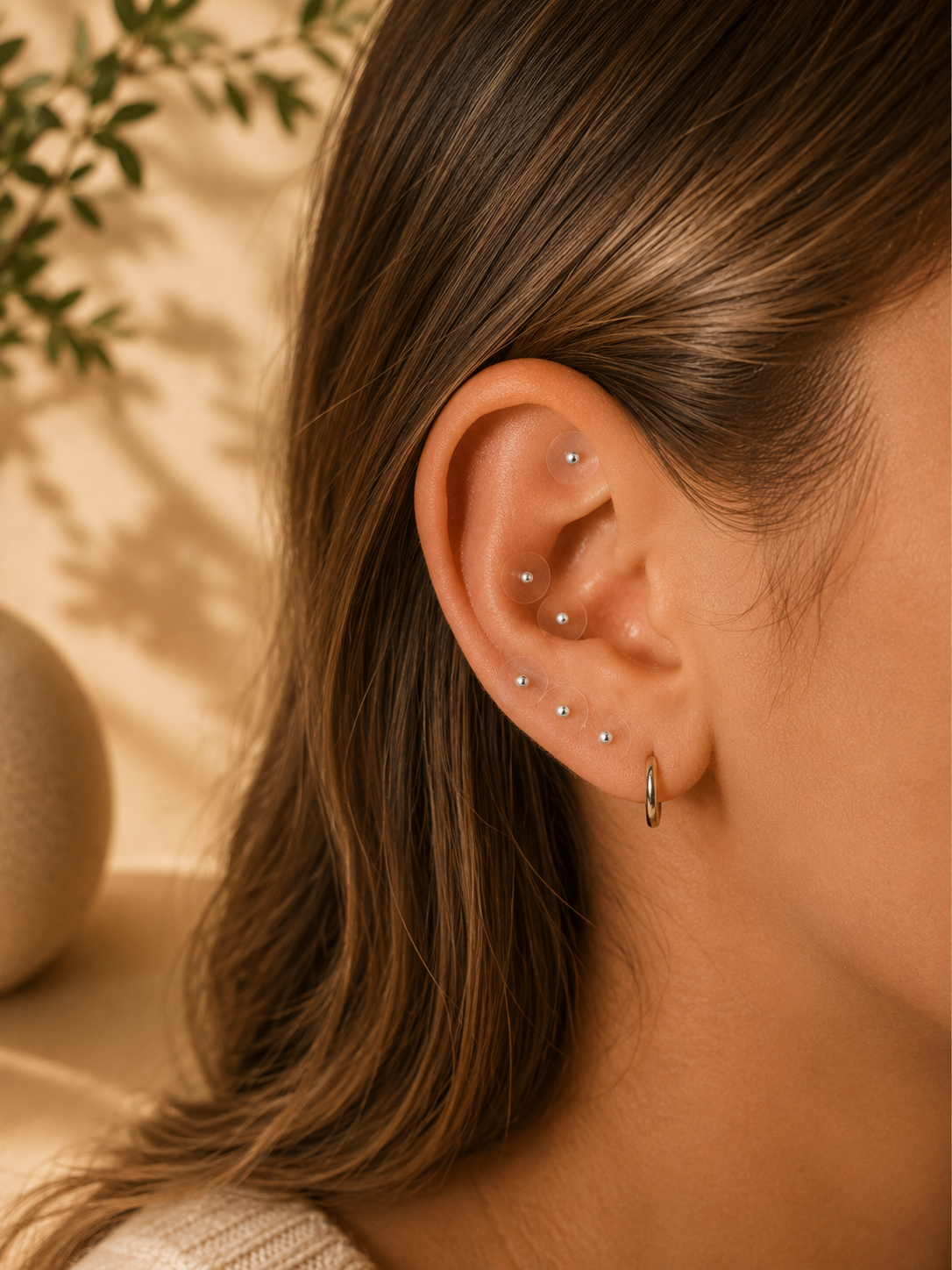 Silver ear seeds applied to the ear
