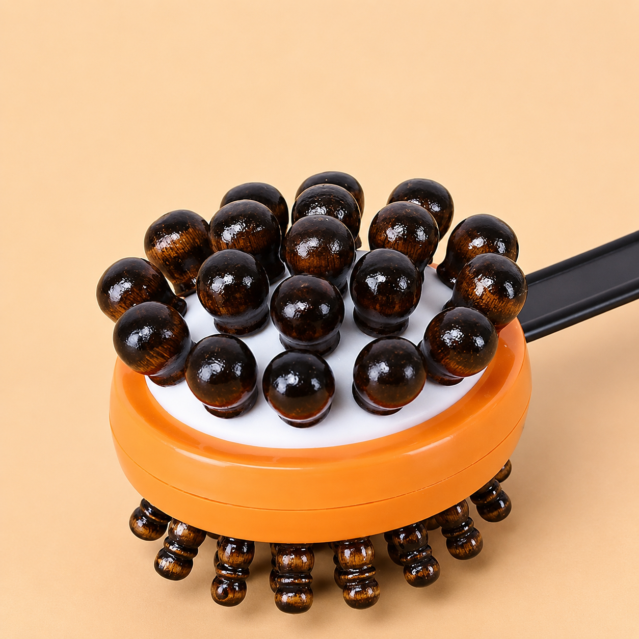 Close-up of the rounded wooden beads on the tapping head